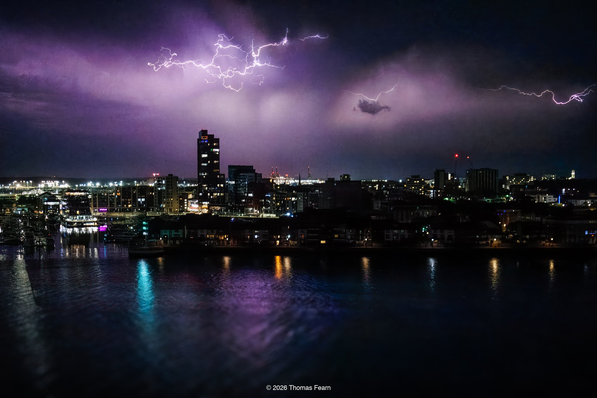 Lightning forking over city skyline
